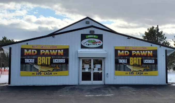 Front exterior of MD Pawn & Bait in Cass Lake, Minnesota